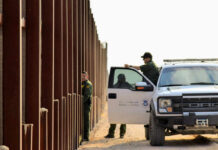 Authorities Warn of New Border Smuggling Tactic U.S. Customs and Border Protection officers near a border fence