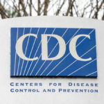 Sign displaying the CDC logo and full name, Centers for Disease Control and Prevention