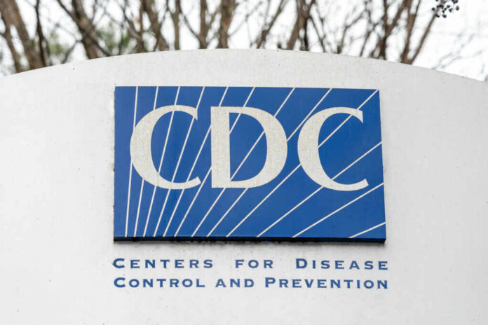 shutterstock2157322993jpg Sign displaying the CDC logo and full name, Centers for Disease Control and Prevention