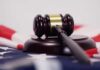 Judge’s Move Shocks Hollywood Judge’s gavel on a base over an American flag