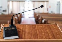 Podium with microphone and Bible in a church