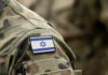 Congressman Held? IDF Denies — What’s the Truth? Close-up of a military uniform with an Israeli flag patch