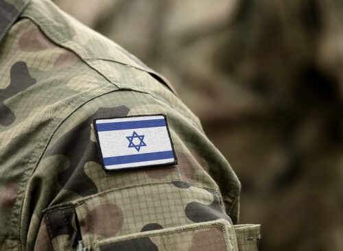 Flag,Of,Israel,On,Military,Uniform.,(collage). Close-up of a military uniform with an Israeli flag patch