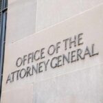 Office of the Attorney General building sign on stone wall