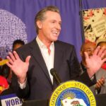 Trusted Insider FLIPPED — Newsom Shaken? A governor speaking at a public event with supporters in the background