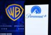 States Revolt Against Hollywood Mega-Merger Logos of Warner Bros and Paramount Plus displayed on a screen