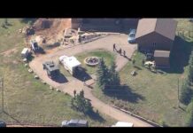 Suspect accused of shooting 2 troopers taken into custody