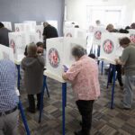 Recount Drama Upends Indiana Primary Voters fill out ballots at polling booths in a busy voting room