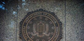 FBI seal on a granite wall