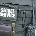 Security Breach Fears Rattle Service Tactical vest with Secret Service patch and gear