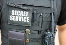 Security Breach Fears Rattle Service Tactical vest with Secret Service patch and gear