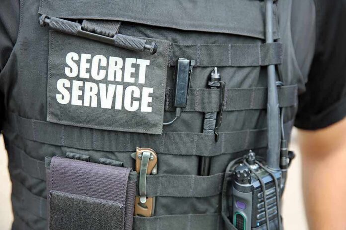 Tactical vest with Secret Service patch and gear