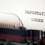 Sickening Abuse Triggers Rapid Deportation Typewriter close-up with document being typed