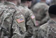 Shock Move: Bogotá Calls In U.S. Military Soldiers in camouflage uniforms with U.S. flag patches