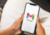 Inbox Nightmare: Political Blasts Incoming Hands holding a smartphone displaying the Gmail app logo
