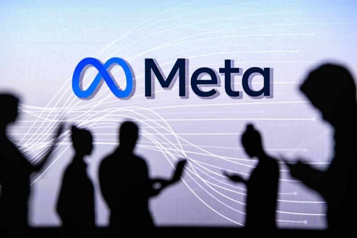 shutterstock_2131709785 Meta logo with silhouetted people using devices