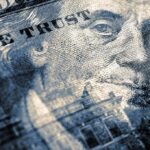 America’s $40 Trillion Debt Just Hit Differently close-up of a US hundred-dollar bill portrait and microprint details