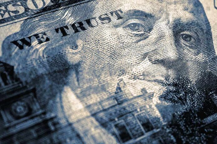 close-up of a US hundred-dollar bill portrait and microprint details