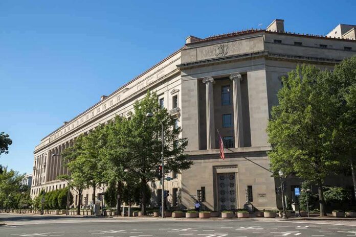 shutterstock_222296509 Neoclassical government building with columns and flag