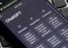 Europe Is Turning Up Pressure On ChatGPT Smartphone showing ChatGPT interface on a keyboard