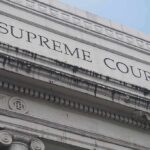 High Court Freezes USPS Ballot Crackdown Supreme Court building facade with classical columns