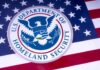 DHS Clash Over Medically Necessary Care U.S. Department of Homeland Security emblem on American flag