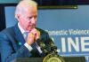 What Biden Actually Withheld From Israel man at podium speaking with hands clasped near chin