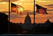 Map Twists Put Congress In Play U.S. Capitol silhouette with American flags at sunset