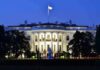 The White House illuminated at dusk