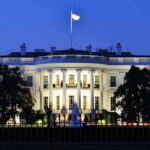 Trump-Xi Dinner Teases Hidden Tech Deal The White House illuminated at dusk