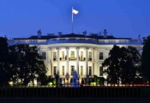 Trump-Xi Dinner Teases Hidden Tech Deal The White House illuminated at dusk