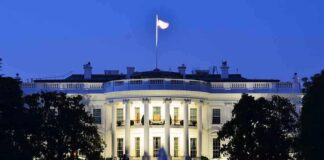 The White House illuminated at dusk