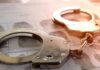 Teen Gunman Caught Minutes After Carnage Handcuffs on a fingerprint form