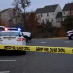 Street Robbery Gone Horribly Wrong Sheriff's vehicles behind yellow do-not-cross tape
