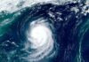 Record-Breaking Surge Stuns Forecasters Satellite view of a powerful hurricane swirling over the ocean