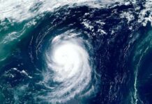 Satellite view of a powerful hurricane swirling over the ocean