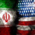 War’s Endgame Teased – Or Escalation? Iran and United States flags with smoky overlay