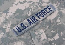 Body In Flames On Secure Base U.S. Air Force name tape on digital camouflage uniform