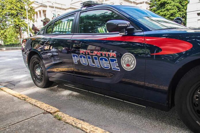 shutterstock_1753633301 Atlanta police car parked on city street
