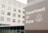 State Department Drops DO NOT TRAVEL Bomb Department of State sign outside office building