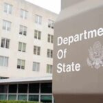 Department of State sign outside office building