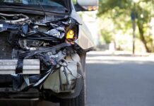 License Loophole Tied To Deadly Crash Front of a car with severe collision damage and exposed headlight