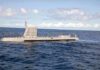 Underwater Snag Exposes Control Gaps Submarine cruising on calm ocean surface