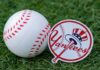 Stadium Chaos Erupts At 9:11 Baseball and team logo sticker on grass