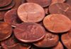 Congress Axes Penny – What Rounds Up? pile of copper pennies with heads side up
