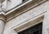 Mortgage Bombshell Hits Fed Governor Federal Reserve building facade in white marble