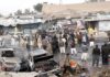 Rescuers Pull Kids From Rubble Crowd gathers at a market after a vehicle explosion