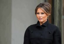 MELANIA Stuns Moscow And Kyiv Melania Trump in a black coat looking to the side