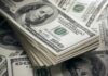 Stack of US 100 dollar bills