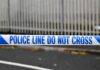 Police tape reading do not cross at a cordoned area